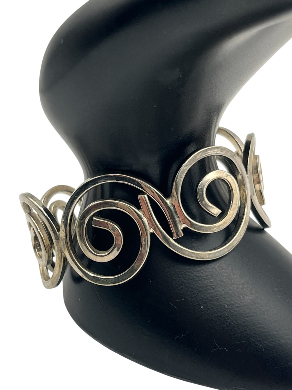 Silver tone Mexico swirl loop vintage cuff bracelet